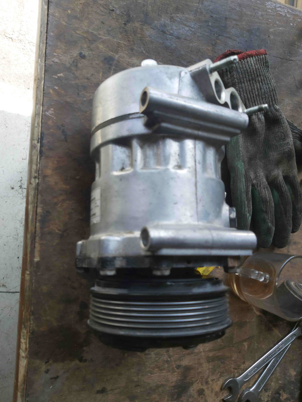 کمپرسور کولر پژو۲۰۶ ۳پیچ ساندن اصلی وارداتی